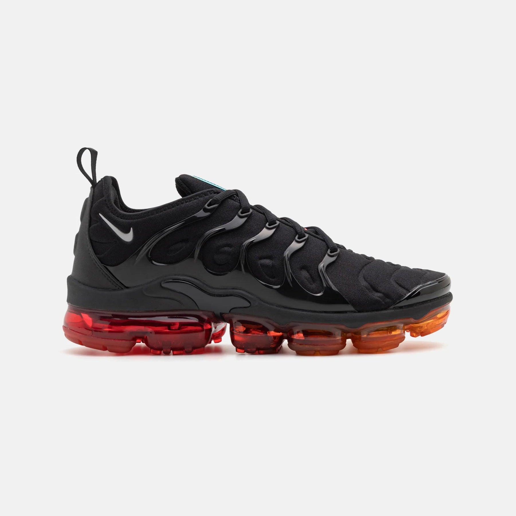 Nike Air VaporMax Plus Black Red Orange sneaker profile view with distinctive colorway and modern design.