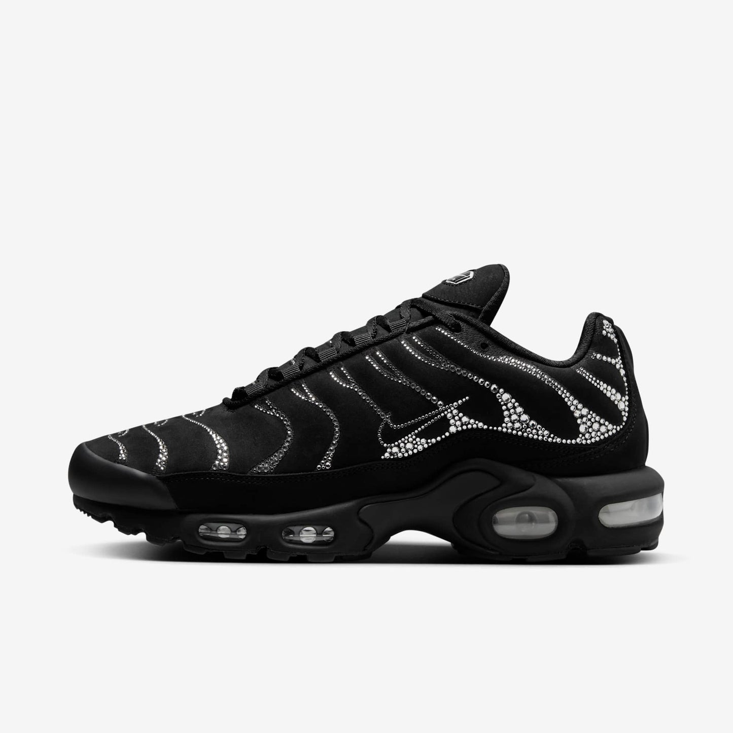 Nike Air Max Plus TN x Swarovski sneaker with shimmering crystals on black mesh upper.