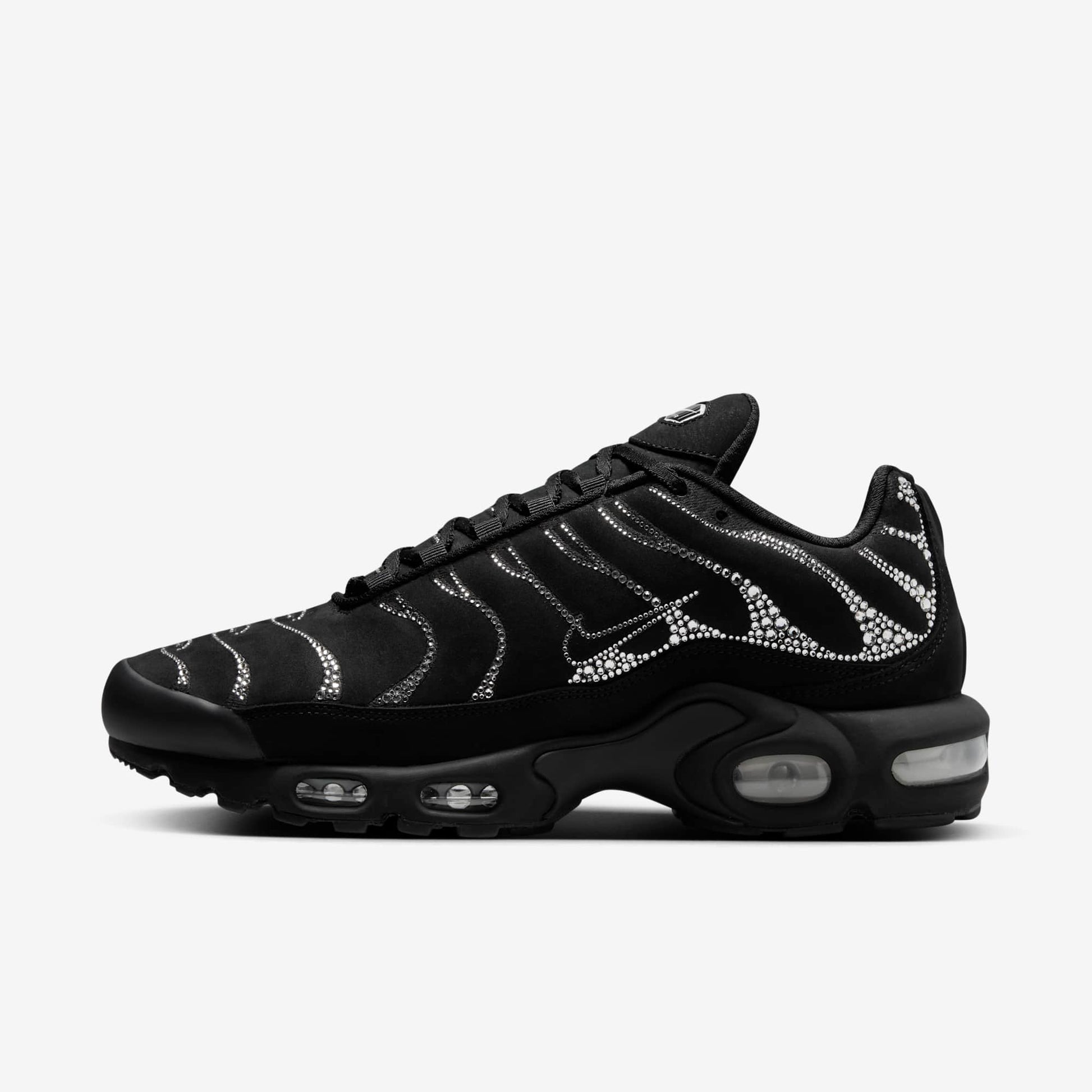 Nike Air Max Plus TN x Swarovski sneaker with shimmering crystals on black mesh upper.