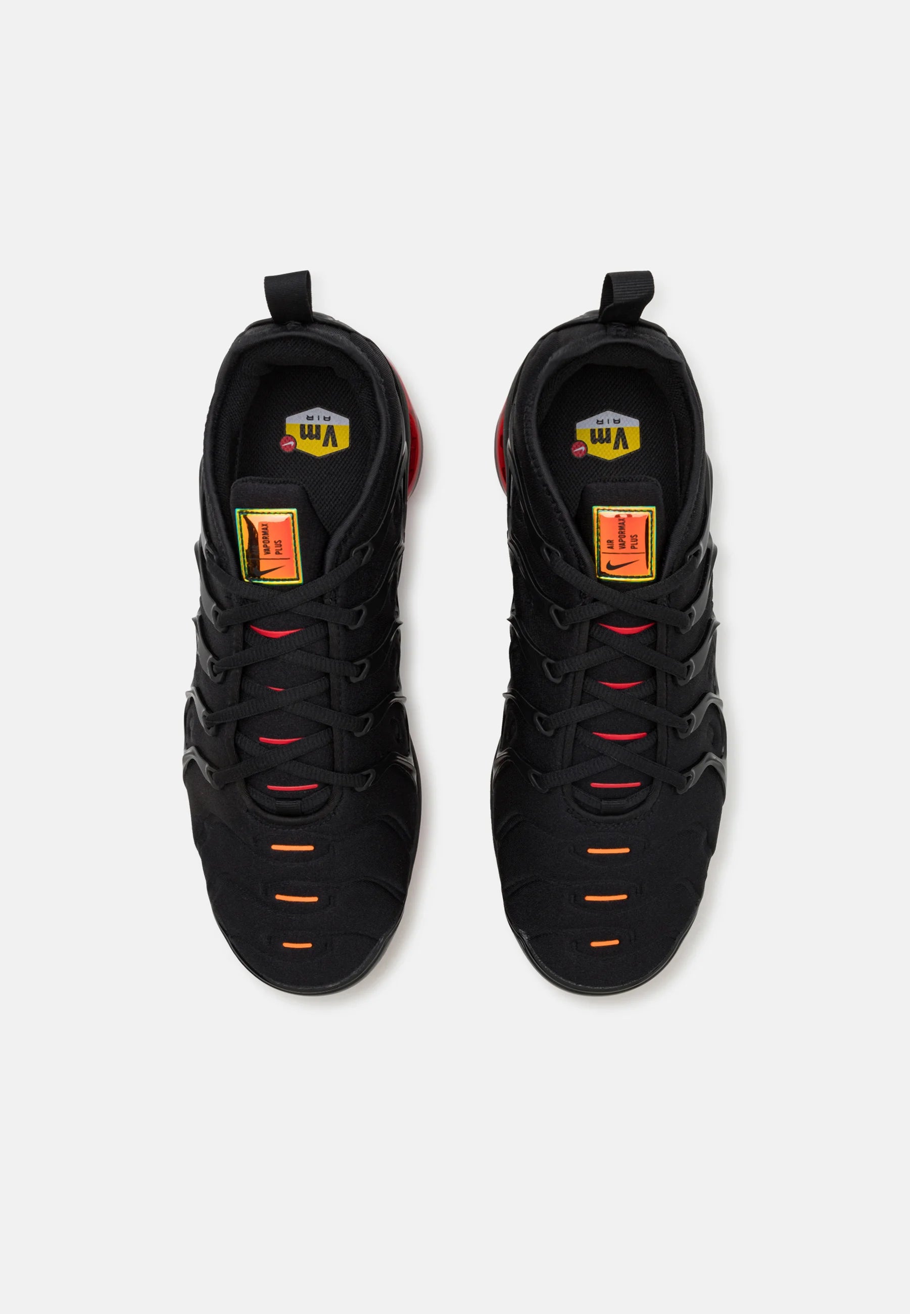 Nike Air VaporMax Plus Black Red Orange sneakers top view showcasing retro design and vibrant color accents.