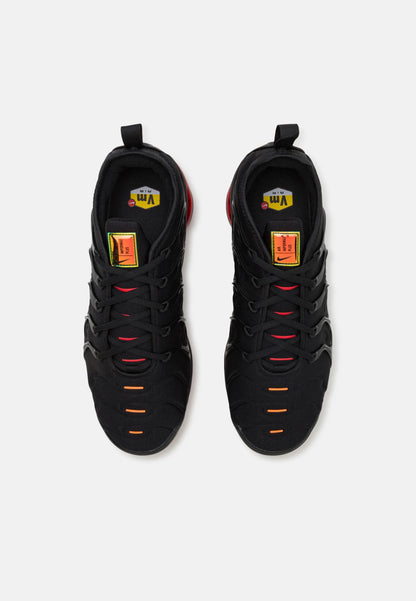 Nike Air VaporMax Plus Black Red Orange sneakers top view showcasing retro design and vibrant color accents.