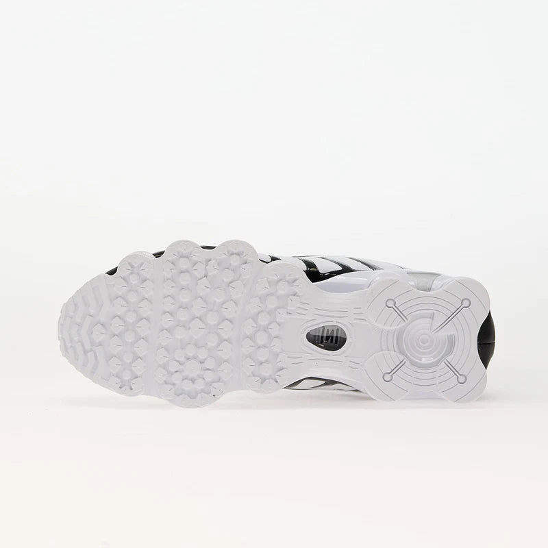 Nike Shox TL White/Black-Metallic Platinum sneaker sole view, showcasing its unique traction pattern.