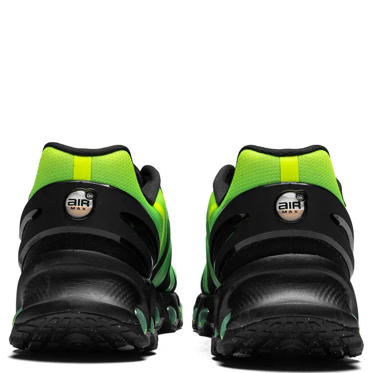Nike Air Max Dn8 Black & Green Strike sneakers rear view showcasing vibrant green details.